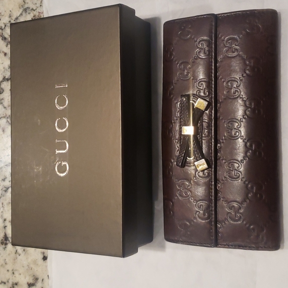 Gucci Handbags - Gucci Guccissima long brown wallet